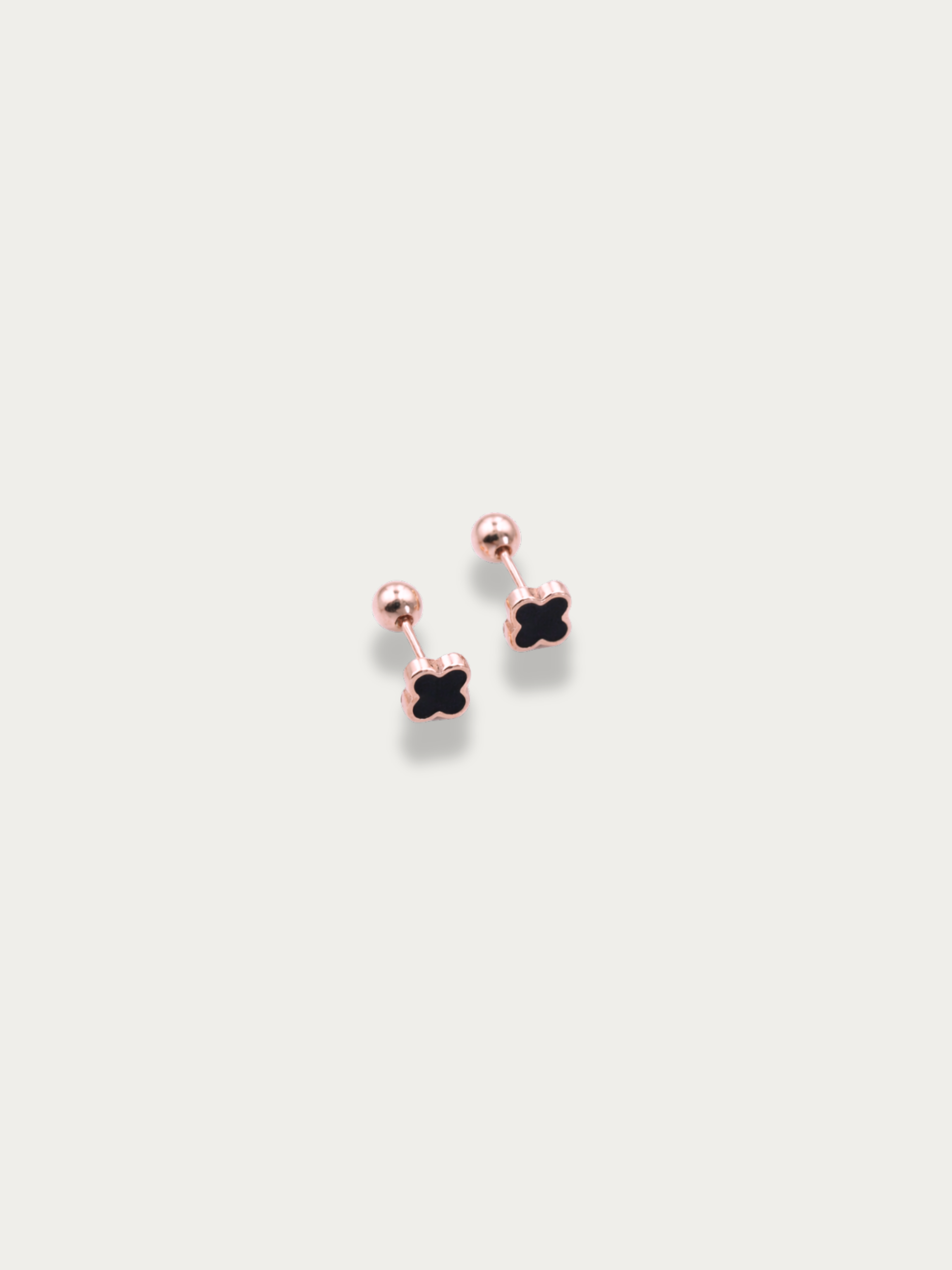 side view of black enamel clover on MNML Black Clover Stud Barbell Earrings — bold enamel detail