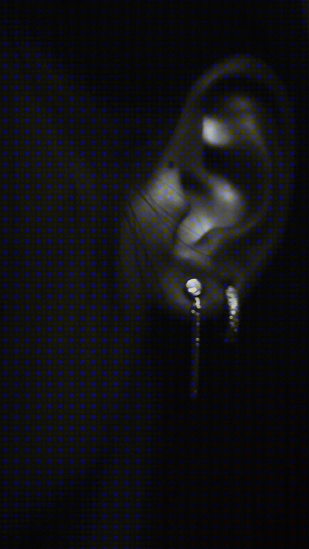 BLAKE hoops styled with other stacked earrings