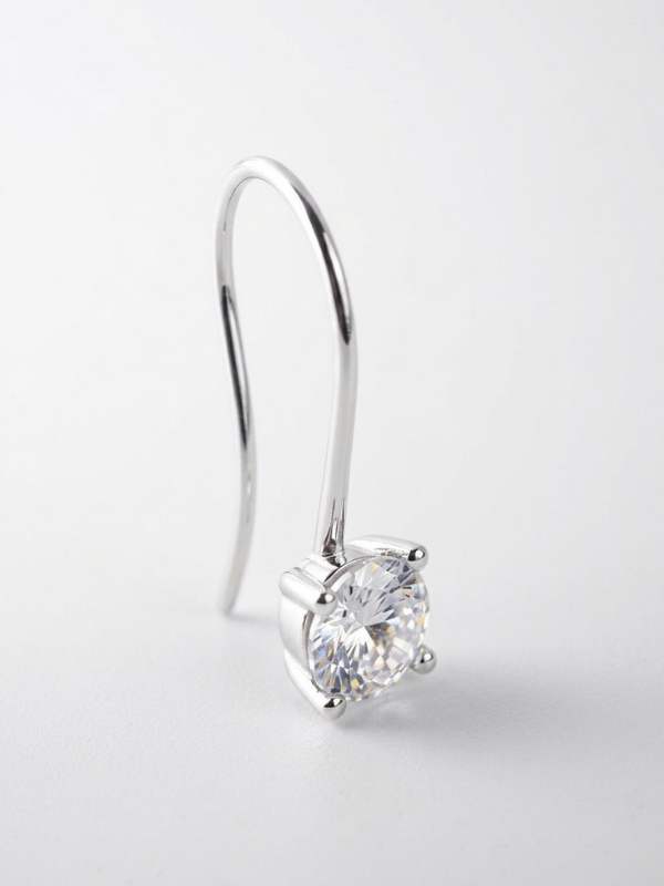 Curved hook silhouette detail on MNML Callie 925 silver rhodium solitaire hook drop