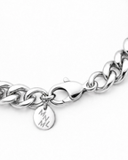 Oversized lobster clasp close-up on MNML Carter Cuban Bracelet Secure Clasp — proportional clasp detail