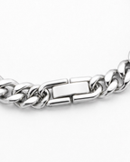 Fold-over clasp detail on MNML Carter Cuban Chain Necklace — flat flush clasp titanium