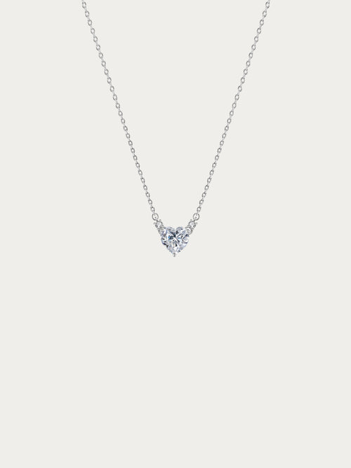 Cherish Heart Spark Necklace with a heart-cut cubic zirconia between two accent stones on 925 sterling silver, front view