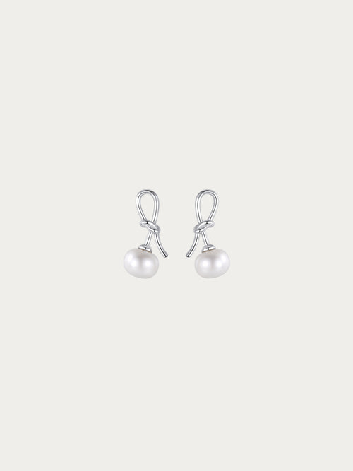 Cherry Bloom earrings with a genuine freshwater pearl hanging from a knotted 925 sterling silver stem, front view