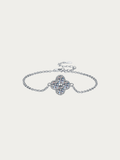 Clara Fortune clover bracelet with a moissanite four-leaf clover on a fine 925 sterling silver chain, front view