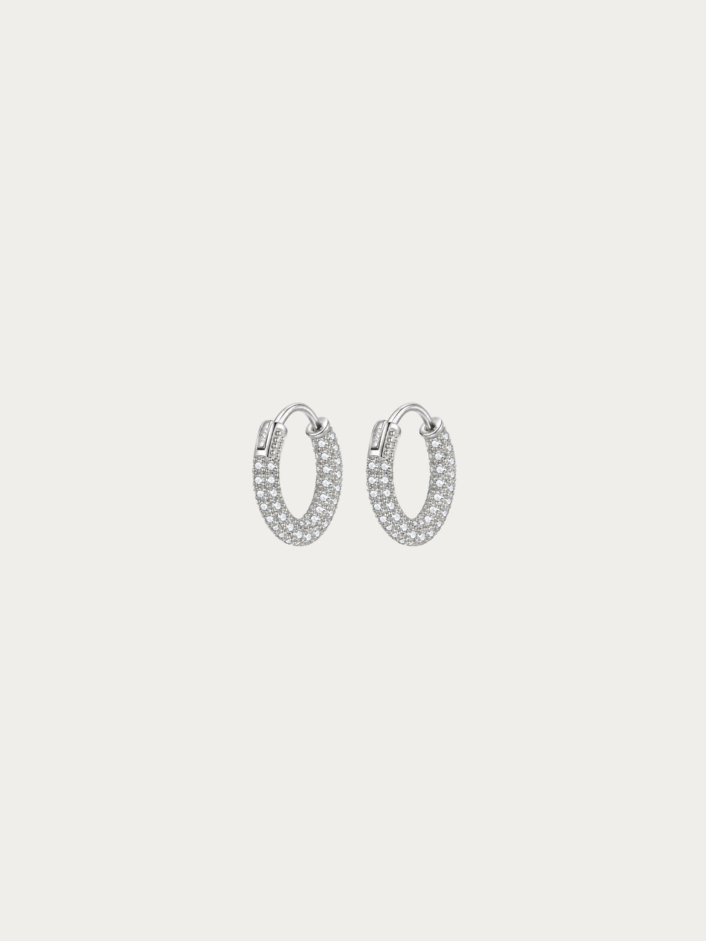 Classic Lush Pavé Huggie Hoop Earrings with a three-row pavé CZ band in rhodium-plated 925 sterling silver, front view