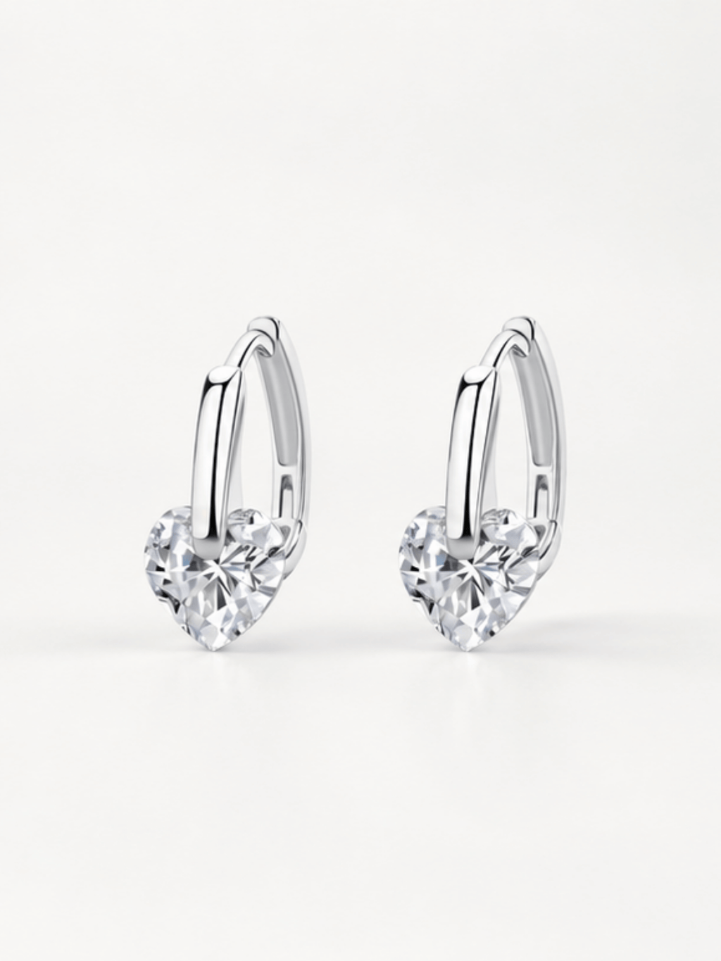 Close-up of the heart-cut cubic zirconia on the Coco Adore huggie