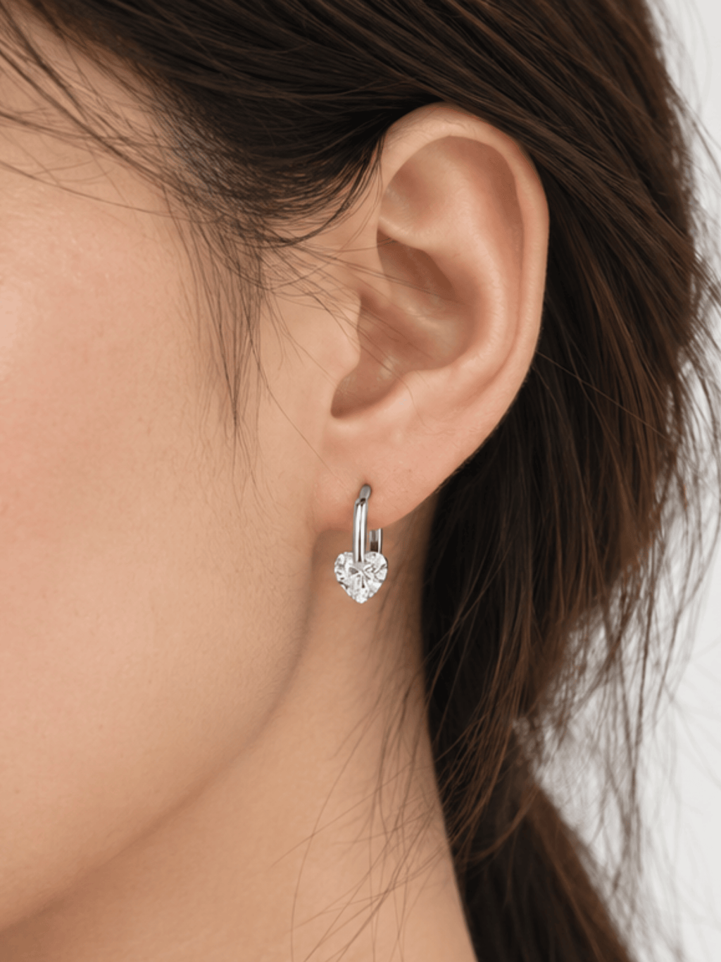 Coco Adore heart huggie worn close to the ear lobe