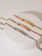MNML Constans Figaro Chain Engravable Bracelet in silver gold and rose gold flat lay — three colour variants
