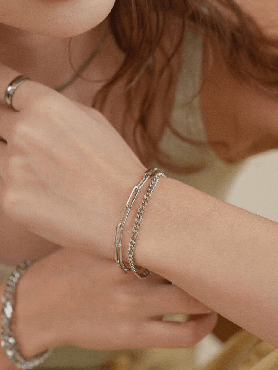 Male model wearing MNML Dualis Paperclip Bracelet — men's layered chain bracelet Malaysia