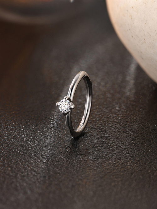 Close-up of 5A CZ crystal accent on MNML Elara Seamless Crystal Hoop — subtle stone detail