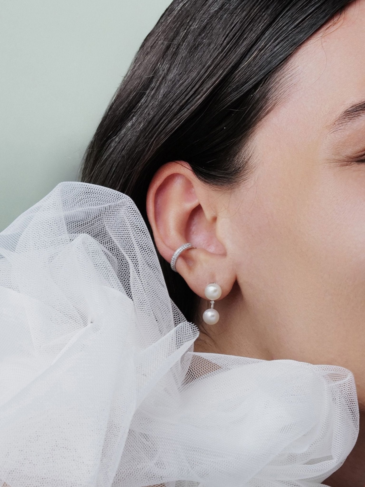 Elena Double Pearl Earrings worn on the ear