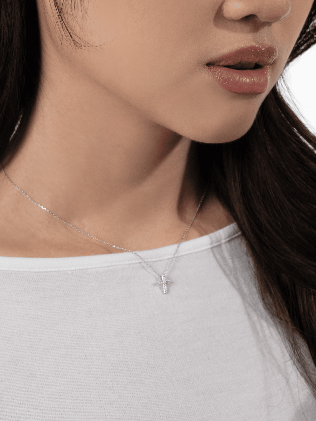 Close-up of the pavé cubic zirconia covering the Elowen cross pendant