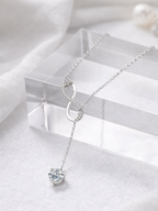 Elyra Infinity Drop Moissanite Necklace laid flat