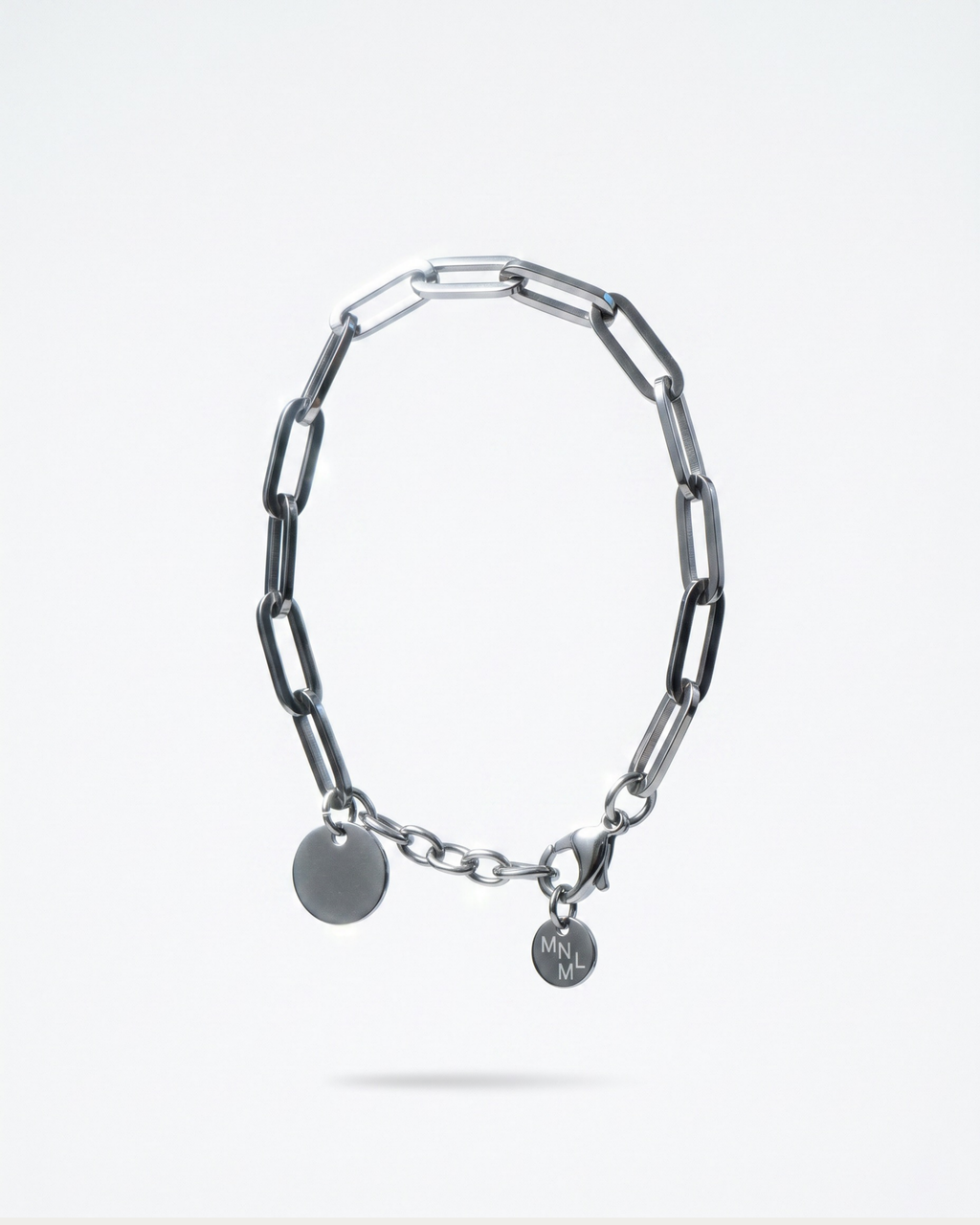 Close-up of oversized paperclip links on MNML Floyd Bracelet — large rectangular link detail