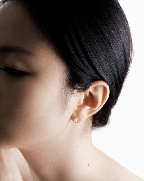 Side view of Hikari pearl drop earring showing CZ and pearl placement