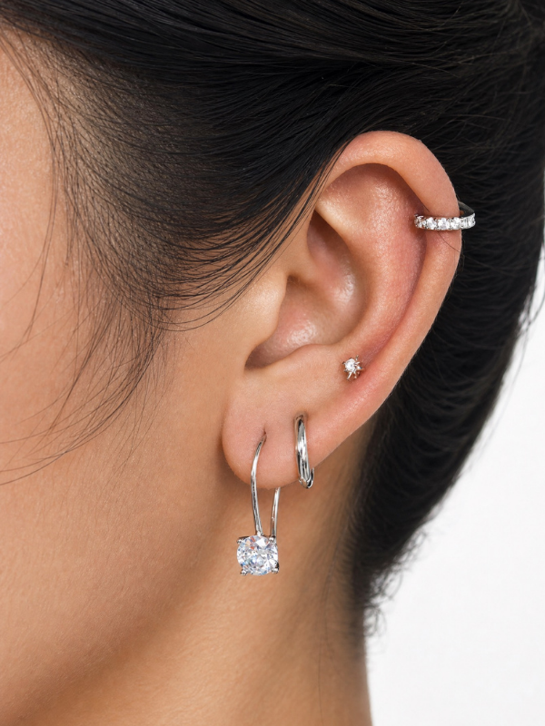 Model wearing MNML Jeanne Full-Front Luxe Single Huggie at lobe — full pavé huggie ear curation Malaysia