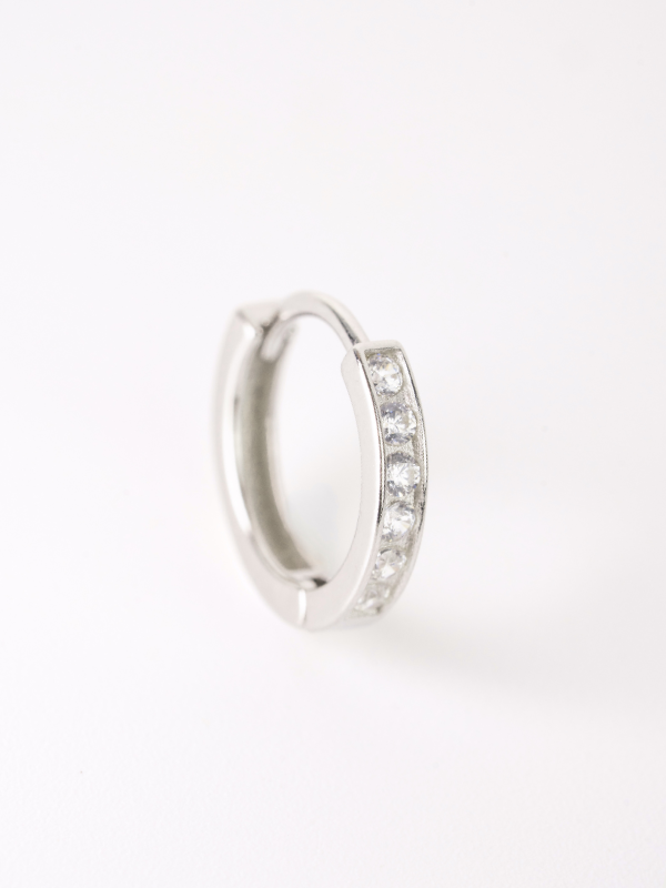 Angular silhouette detail on MNML Liora Pavé Single Huggie — structured slim 925 silver rhodium