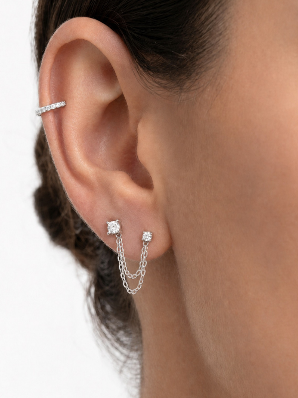 Model wearing MNML Liora Pavé Single Huggie at lobe — angular pavé huggie ear curation Malaysia