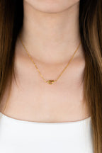 Close-up of fixed knot centrepiece on MNML Love Me Knot Necklace — symbolic knot detail
