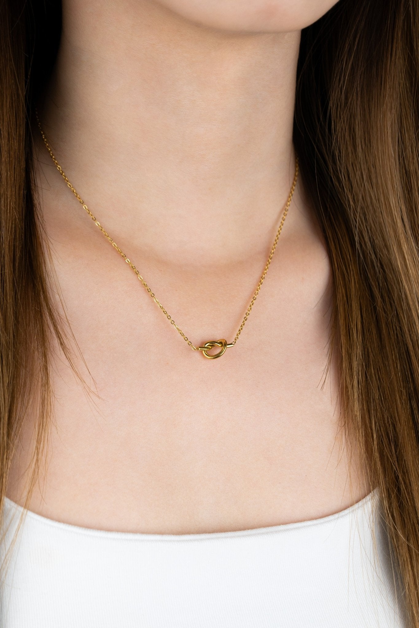 Model wearing MNML Love Me Knot Necklace — everyday knot necklace Malaysia