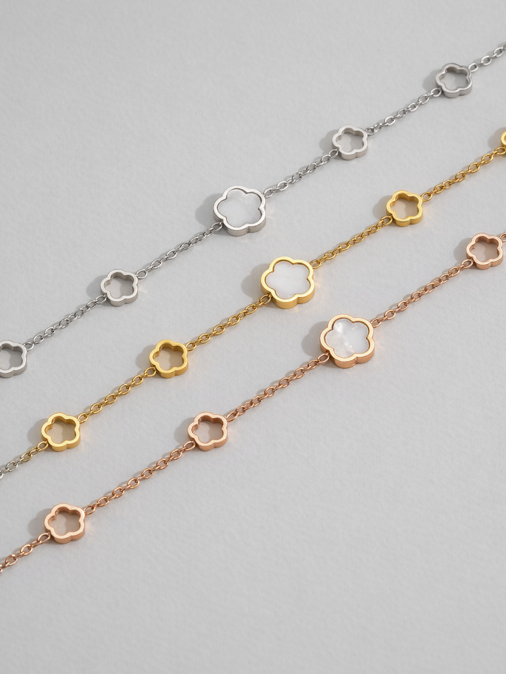 MNML Luna Blossom Radiance Bracelet in silver gold and rose gold flat lay — three colour variants