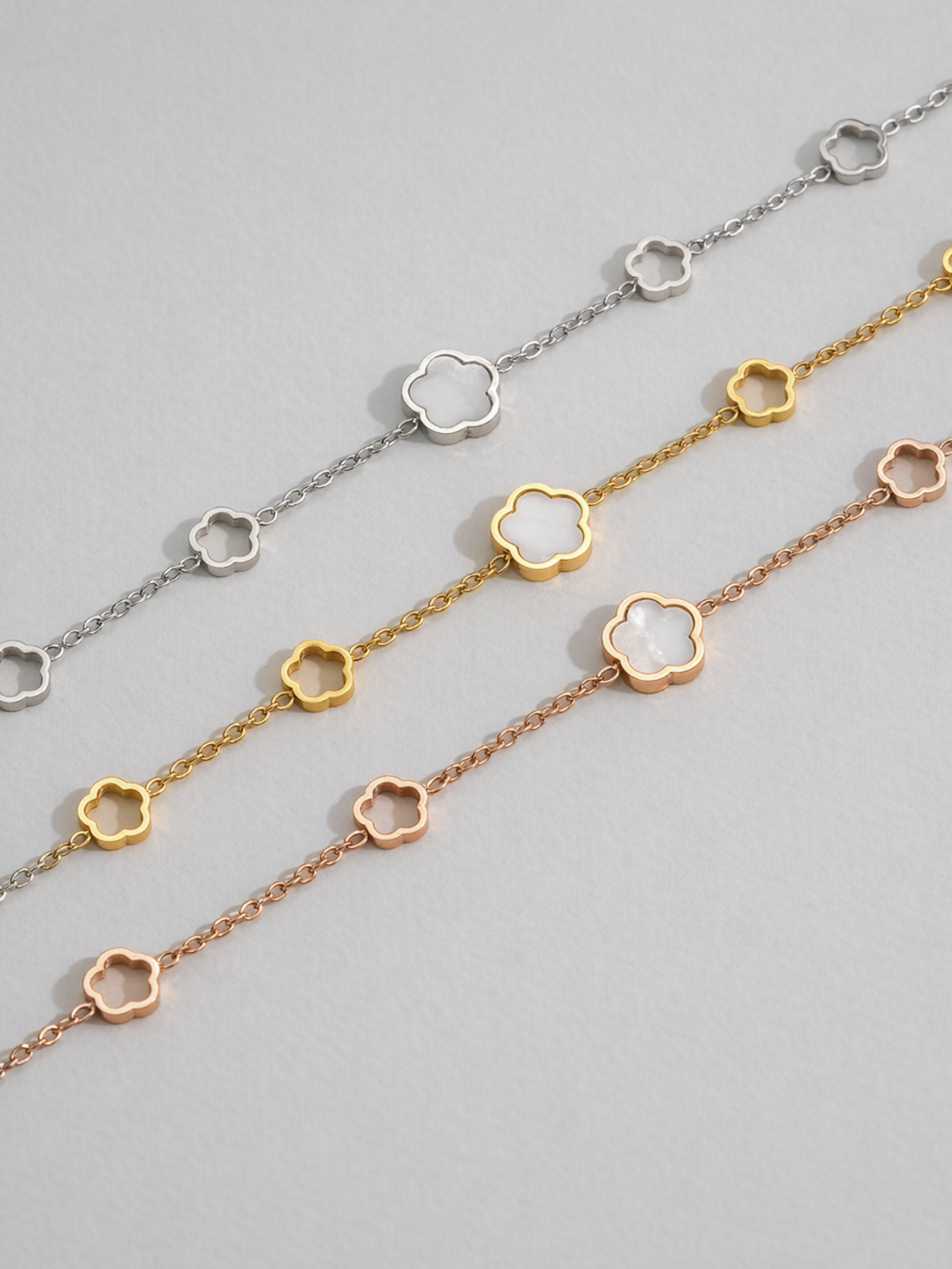MNML Luna Blossom Radiance Bracelet in silver gold and rose gold flat lay — three colour variants