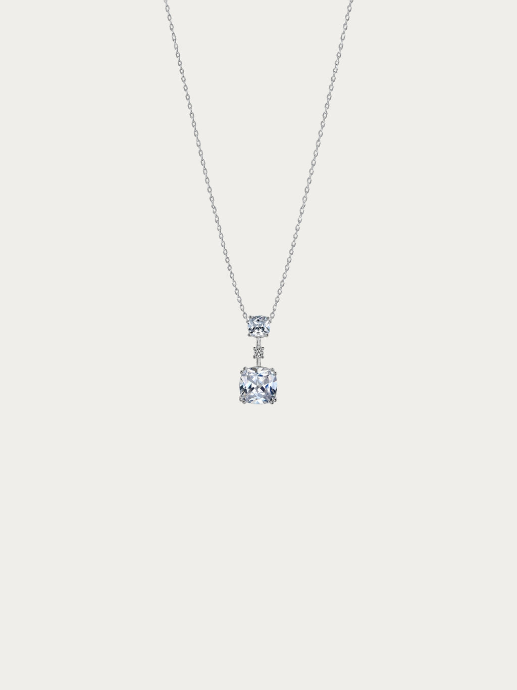 Marie necklace with two cushion-cut cubic zirconia stones joined by a pavé line on 925 sterling silver, front view
