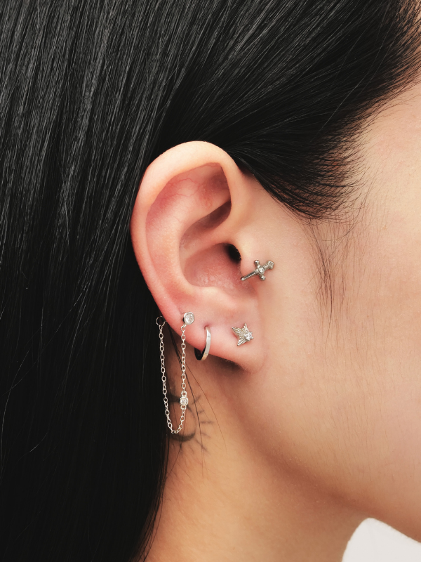 Model wearing MNML Maris Flowchain Single Butterfly Stud — ear curation chain earring Malaysia