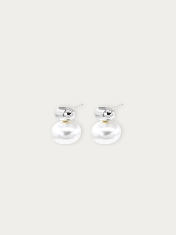 Pair of Mila Pearlform Earrings laid flat