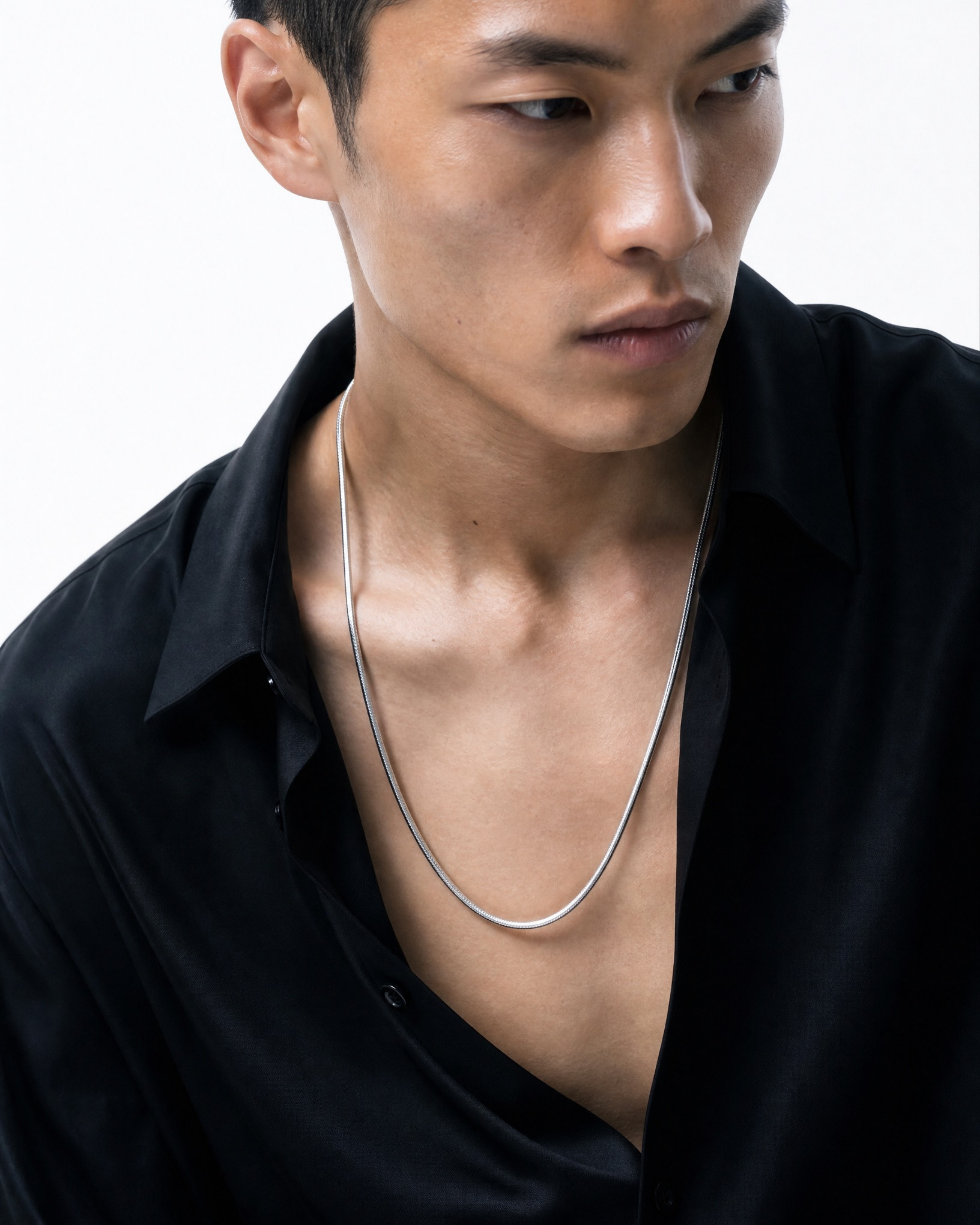 Close-up of 2mm snake links on MNML Minimalist Macro Snake Chain Necklace — coiled link detail