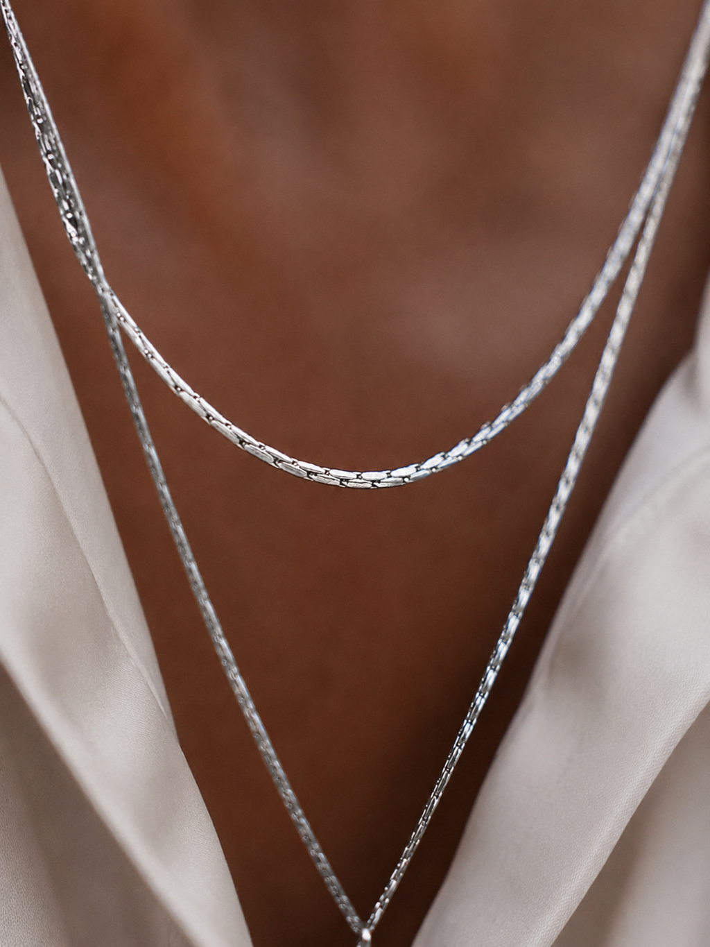 Close-up of twisted wheat link texture on MNML Wheat Chain Necklace — woven stainless steel detail