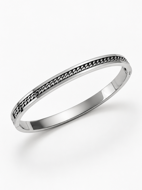 Close-up of the curb chain inset into the channel of the Mono Chain Bangle