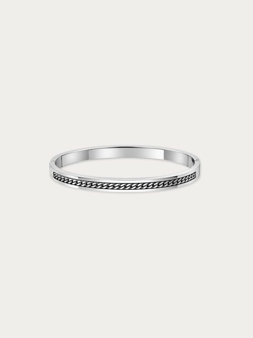 Mono Chain Bangle in polished steel, with a curb chain set into a channel along its face, front view