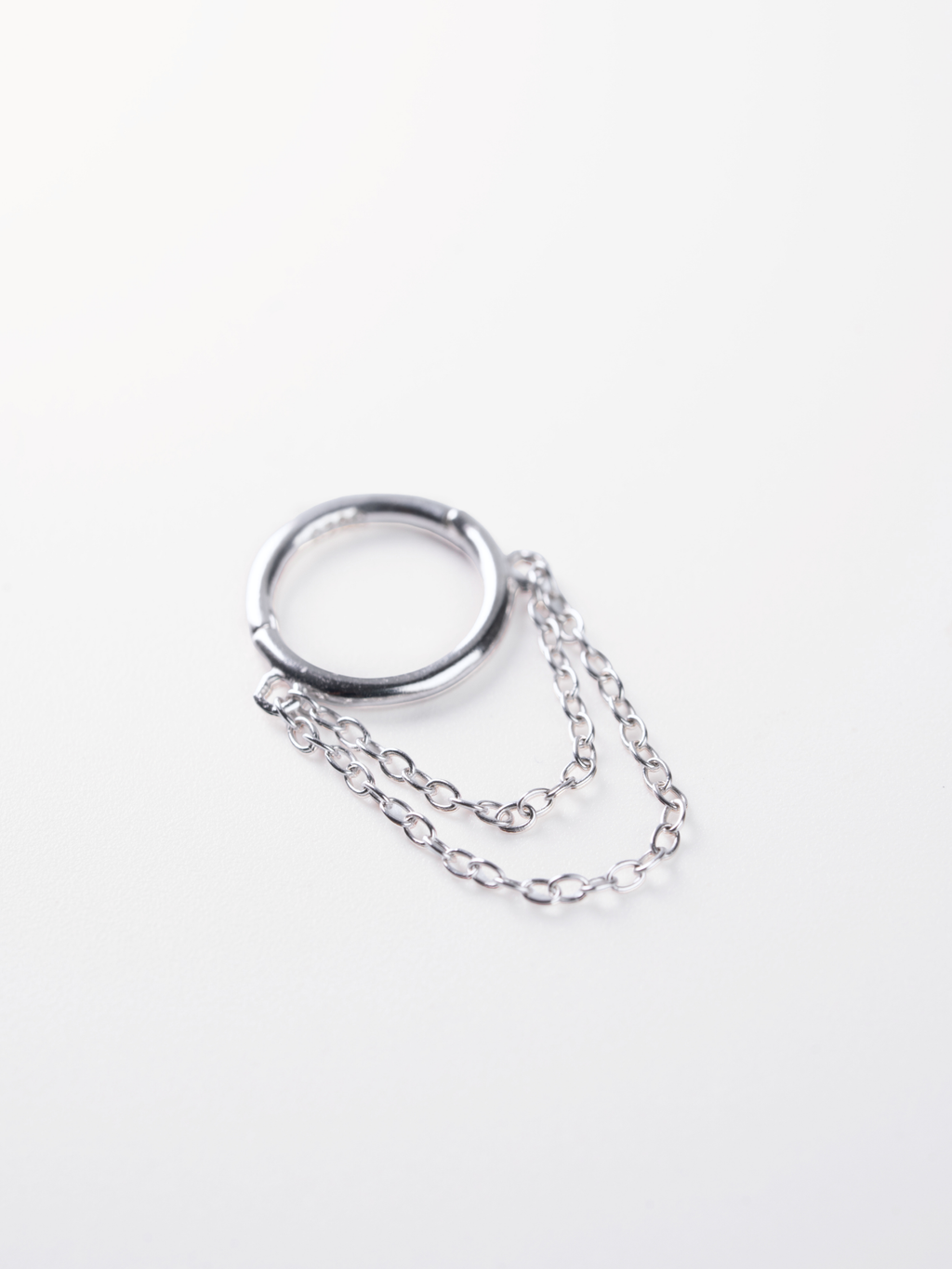 Chain drape detail on MNML Nia Minimalist Double Chain Hoop — cascading double chain below hoop