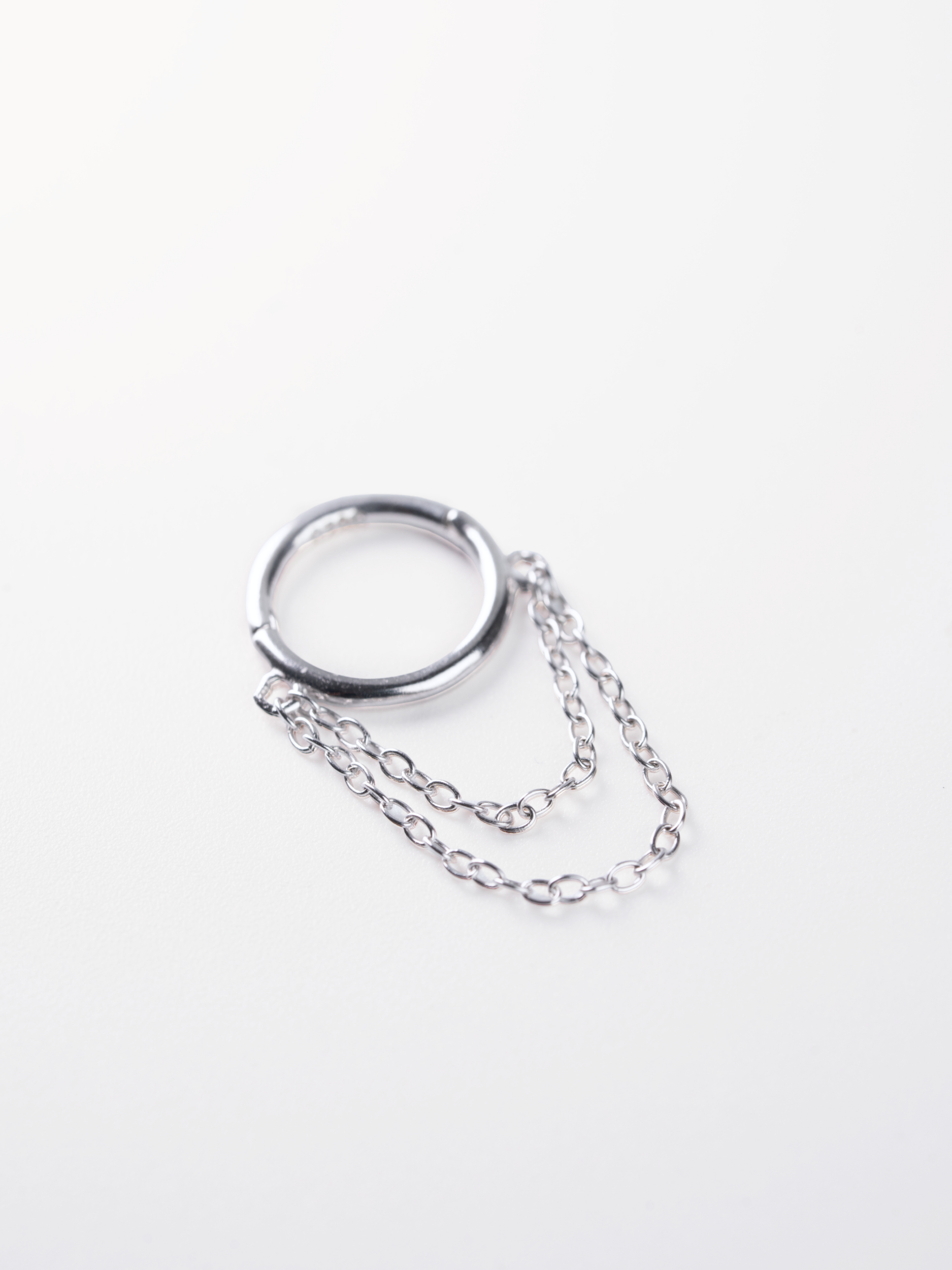 Chain drape detail on MNML Nia Minimalist Double Chain Hoop — cascading double chain below hoop