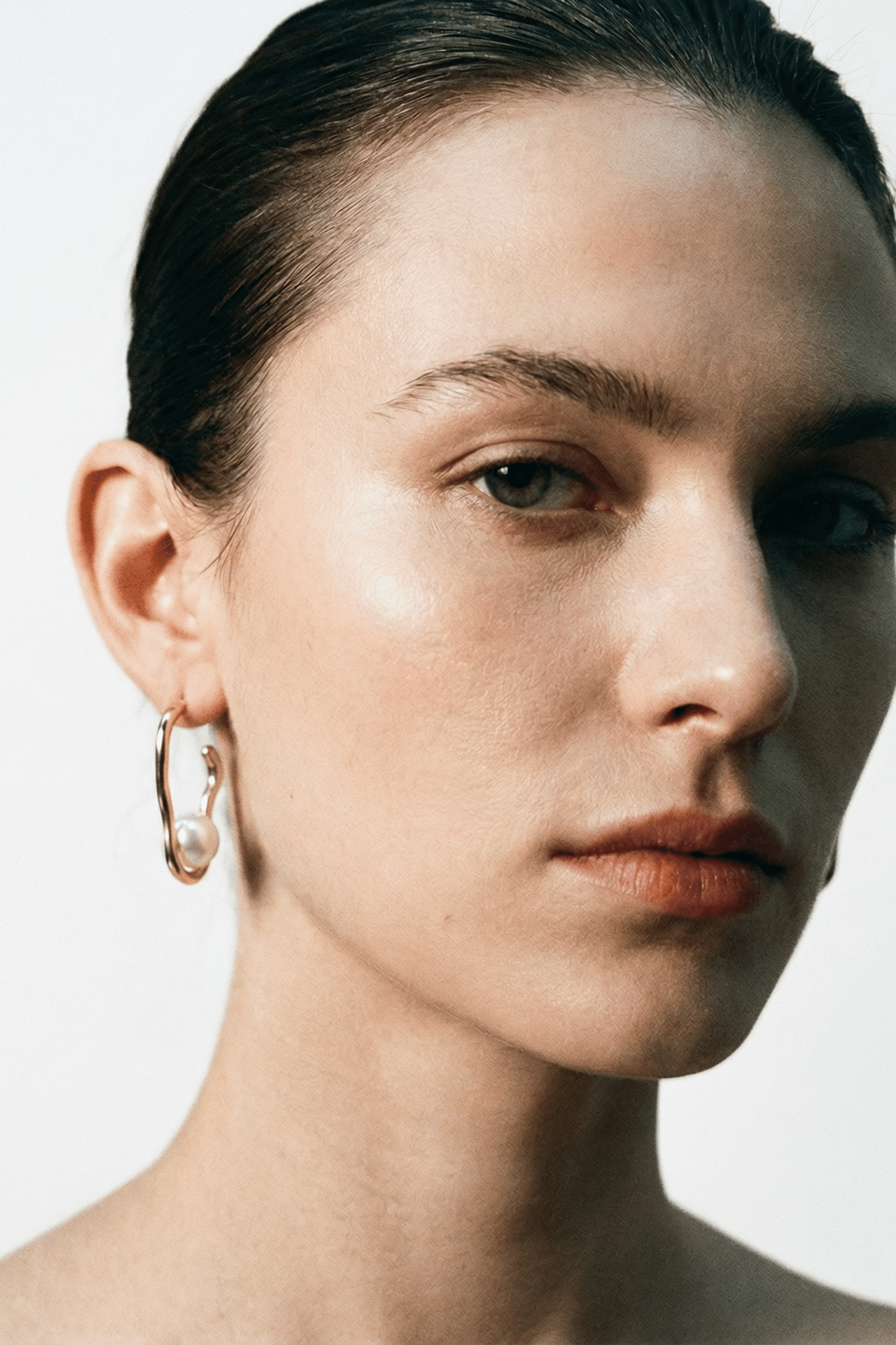 Model wearing MNML Nova Sculpt Pearl Earrings — bold statement pearl earrings everyday Malaysia