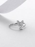 Close-up of the moissanite butterfly cluster on the Odette ring