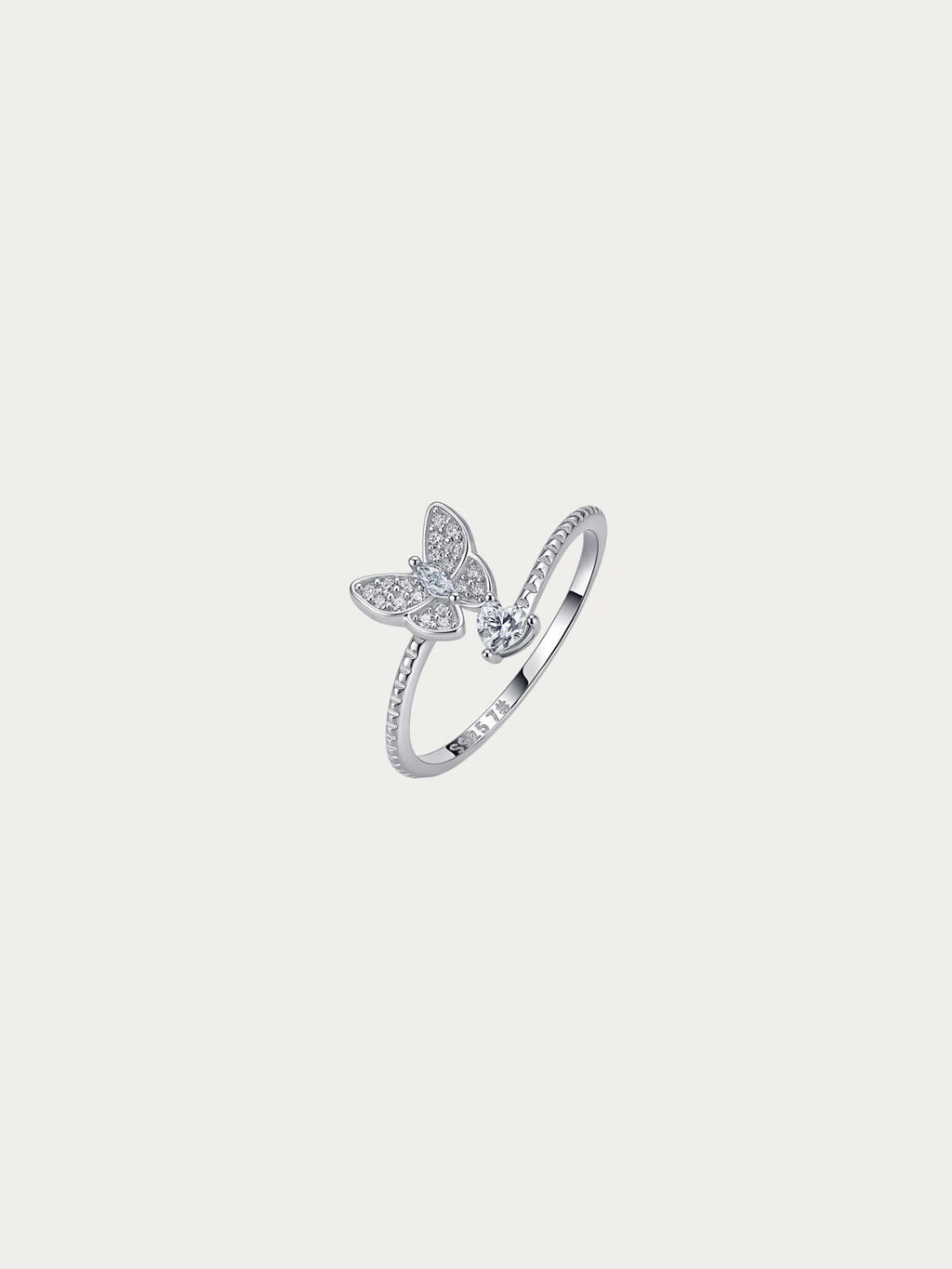 Odette ring with a moissanite butterfly cluster and round moissanite solitaire on an open adjustable band, front view