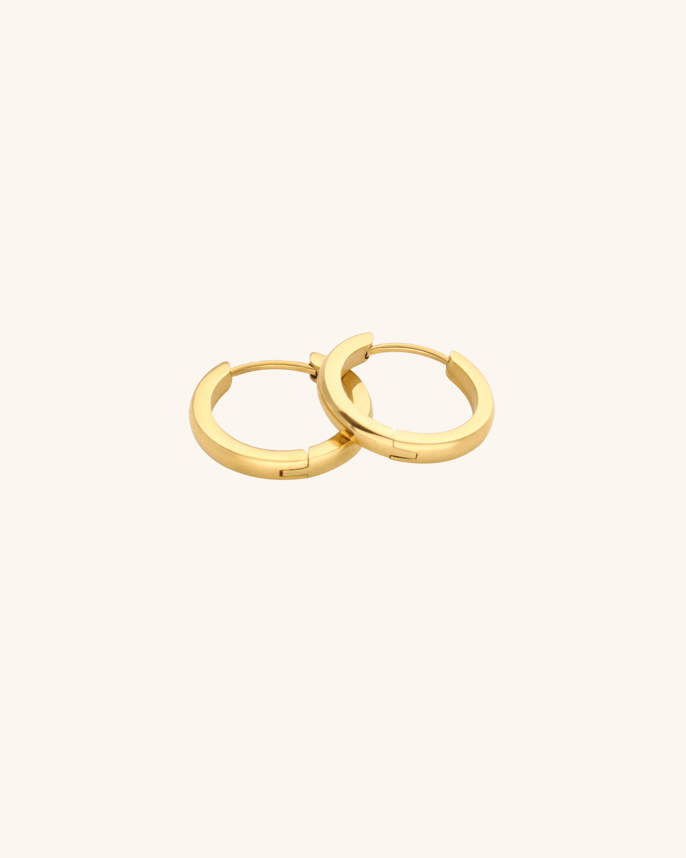 MNML Oliva Huggie Hoop Earrings in 18K gold plated titanium — everyday gold hoops Malaysia
