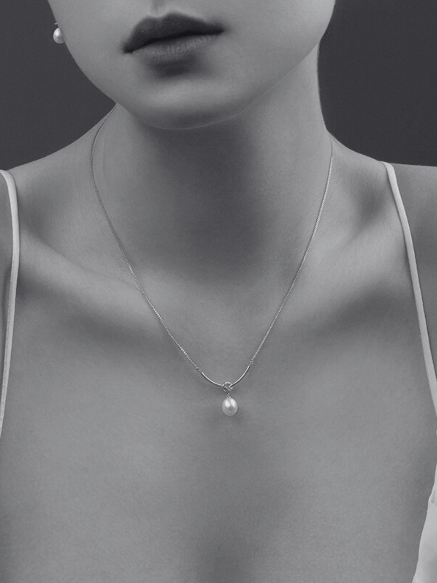 Ophelia necklace worn on the neck, front view