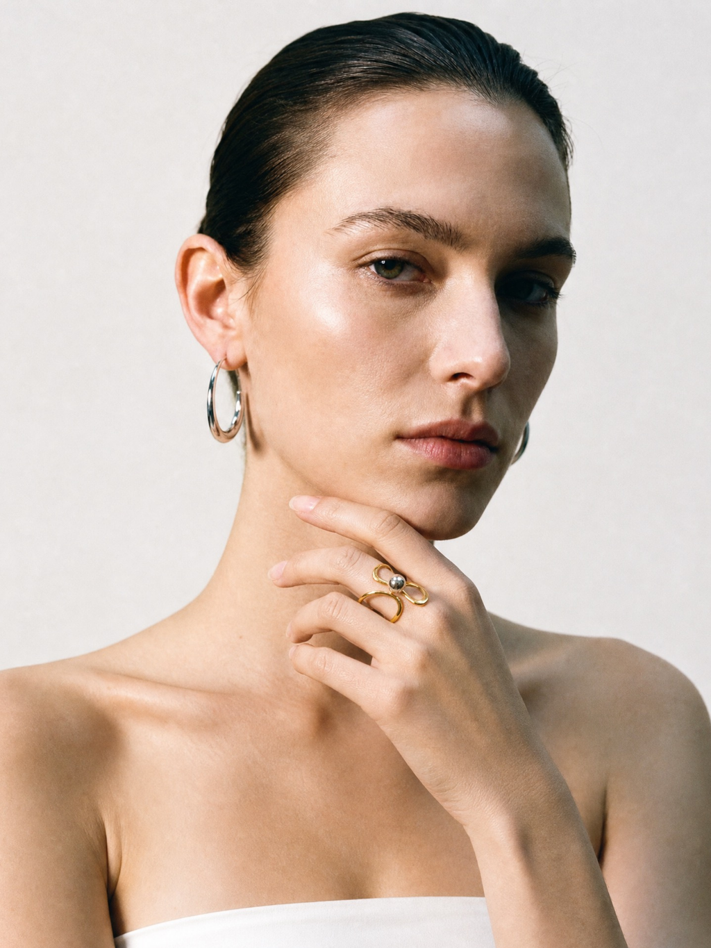Model wearing MNML Orb Twist Open Ring on finger — gold everyday ring Malaysia