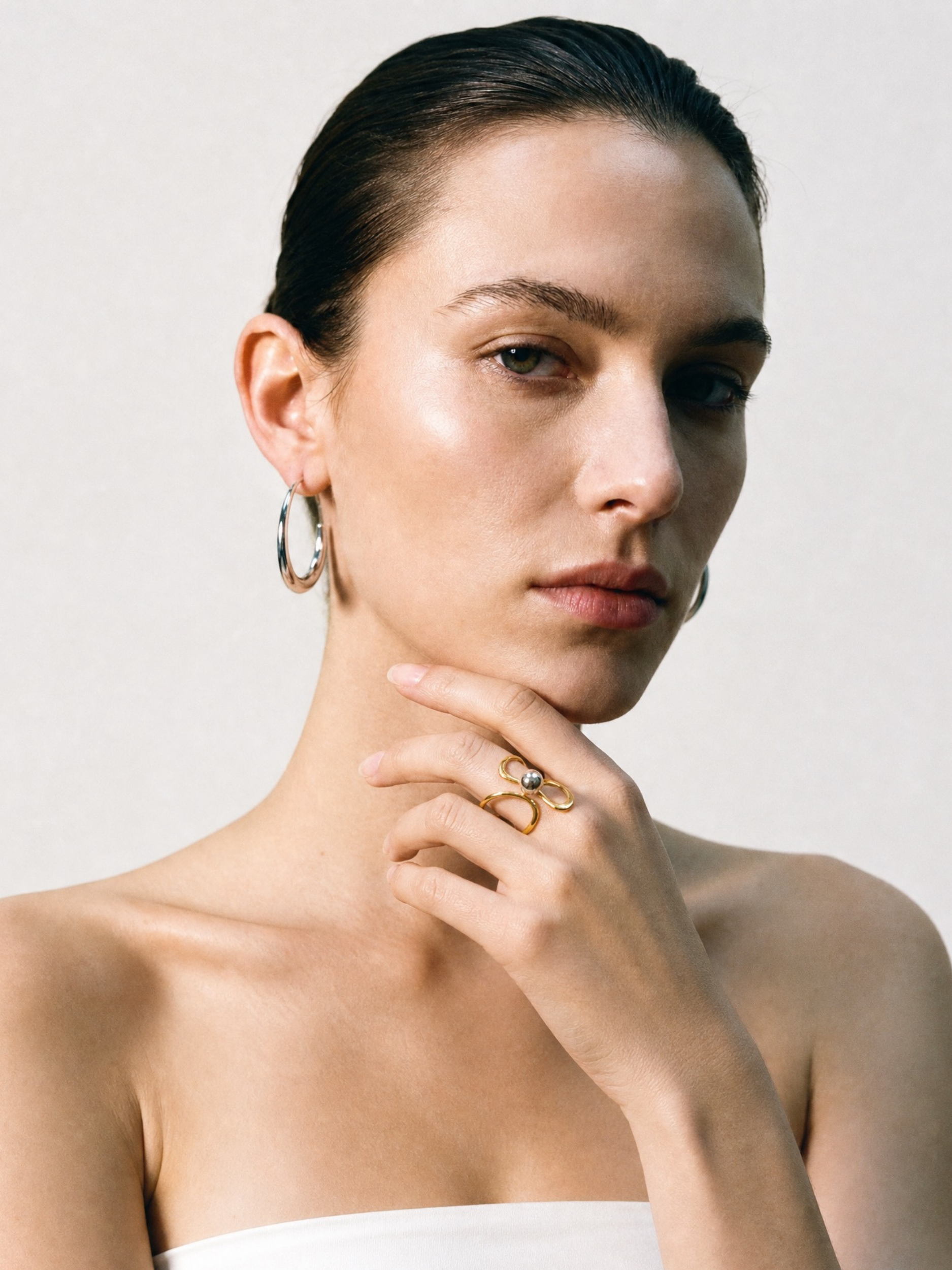 Model wearing MNML Orb Twist Open Ring on finger — gold everyday ring Malaysia