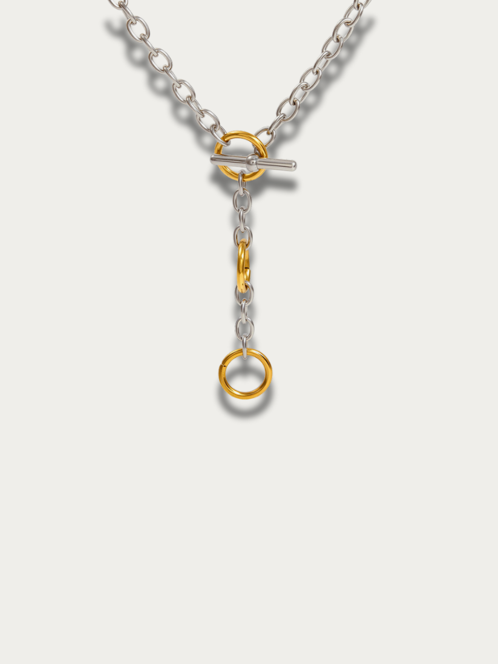 Dual-tone front detail on MNML Play Link Toggle Necklace — silver chain with gold circle links