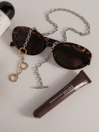 Close-up of three gold circle links on MNML Play Link Toggle Necklace — dual-tone focal detail