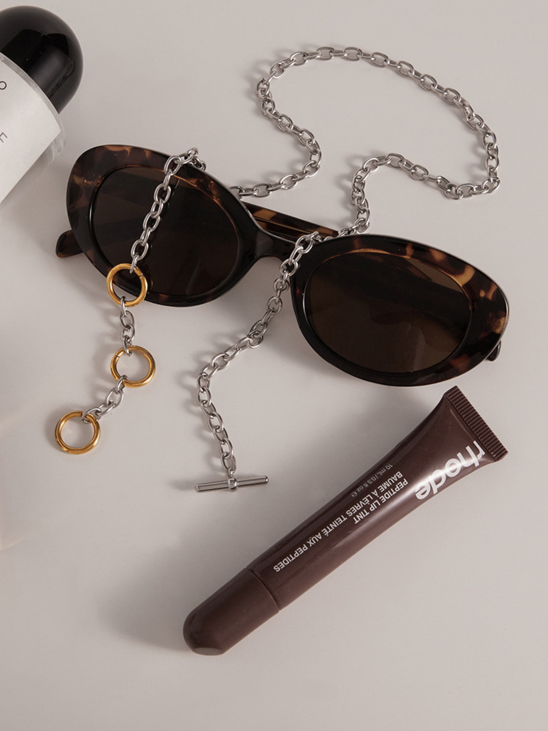 Close-up of three gold circle links on MNML Play Link Toggle Necklace — dual-tone focal detail
