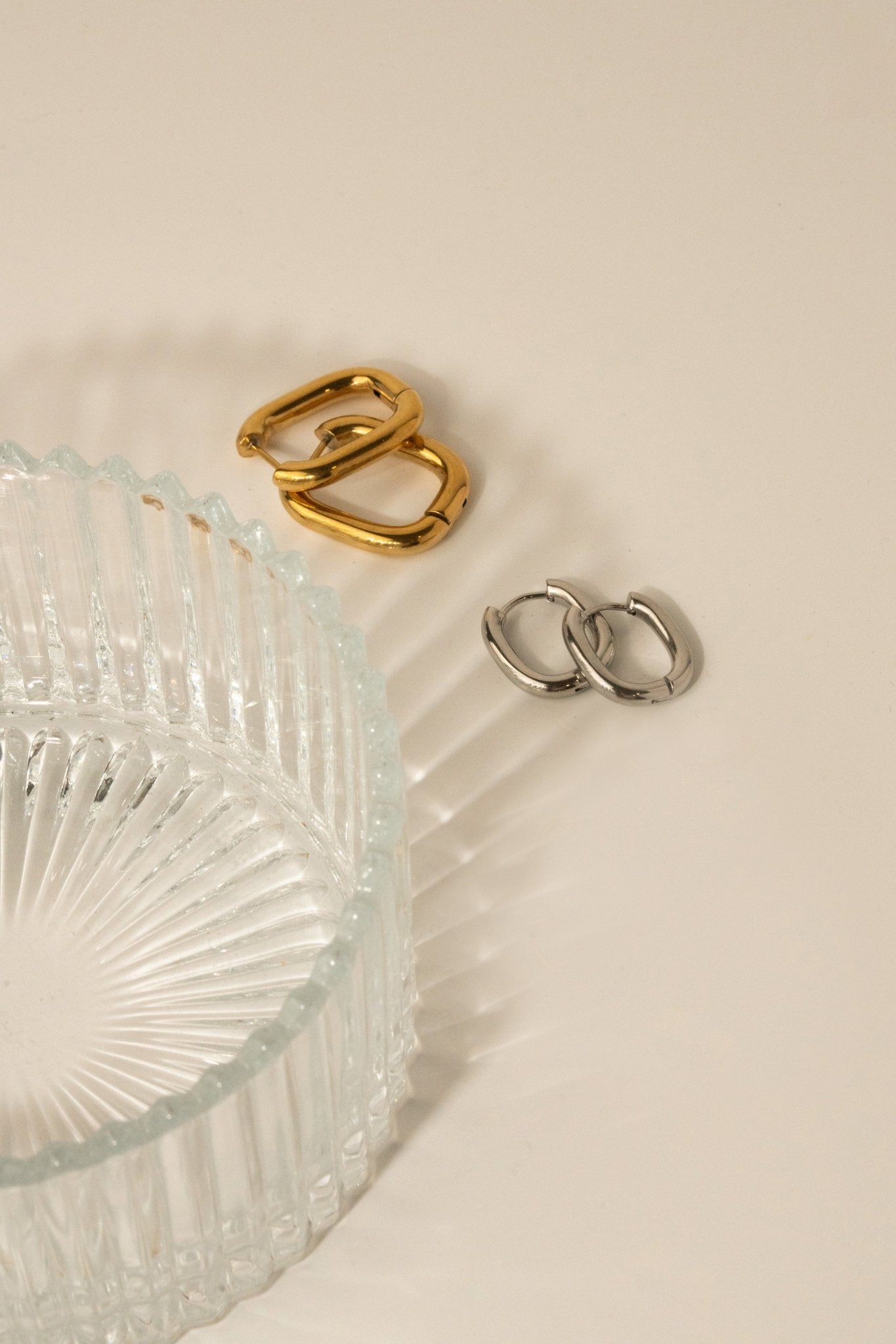 Close-up of polished tube on MNML Rainnie Oval Ear Hoops — smooth high-polish stainless steel