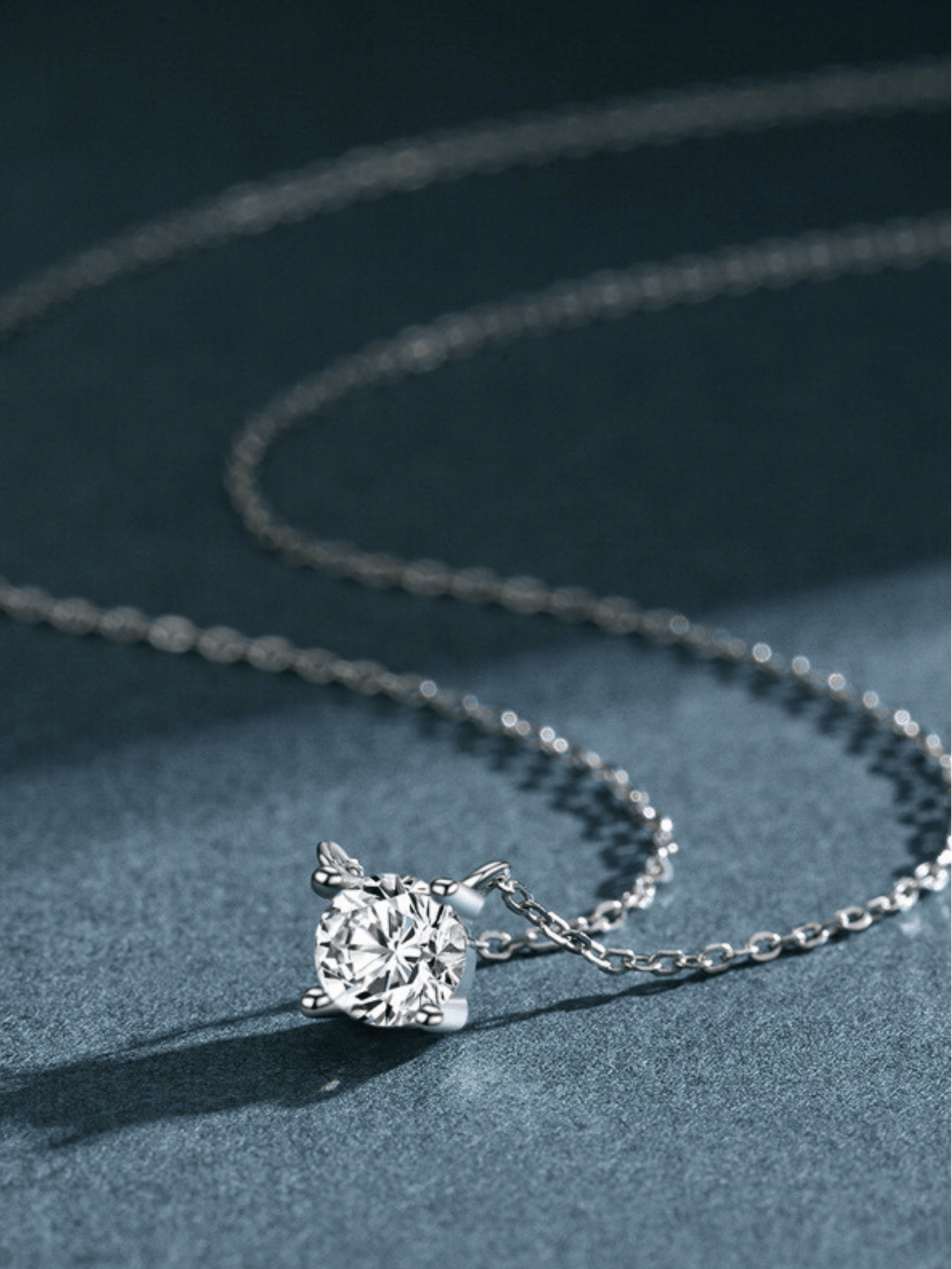Close-up of prong setting on MNML Ray Solitaire Diamond Necklace — classic claw CZ setting 925 silver