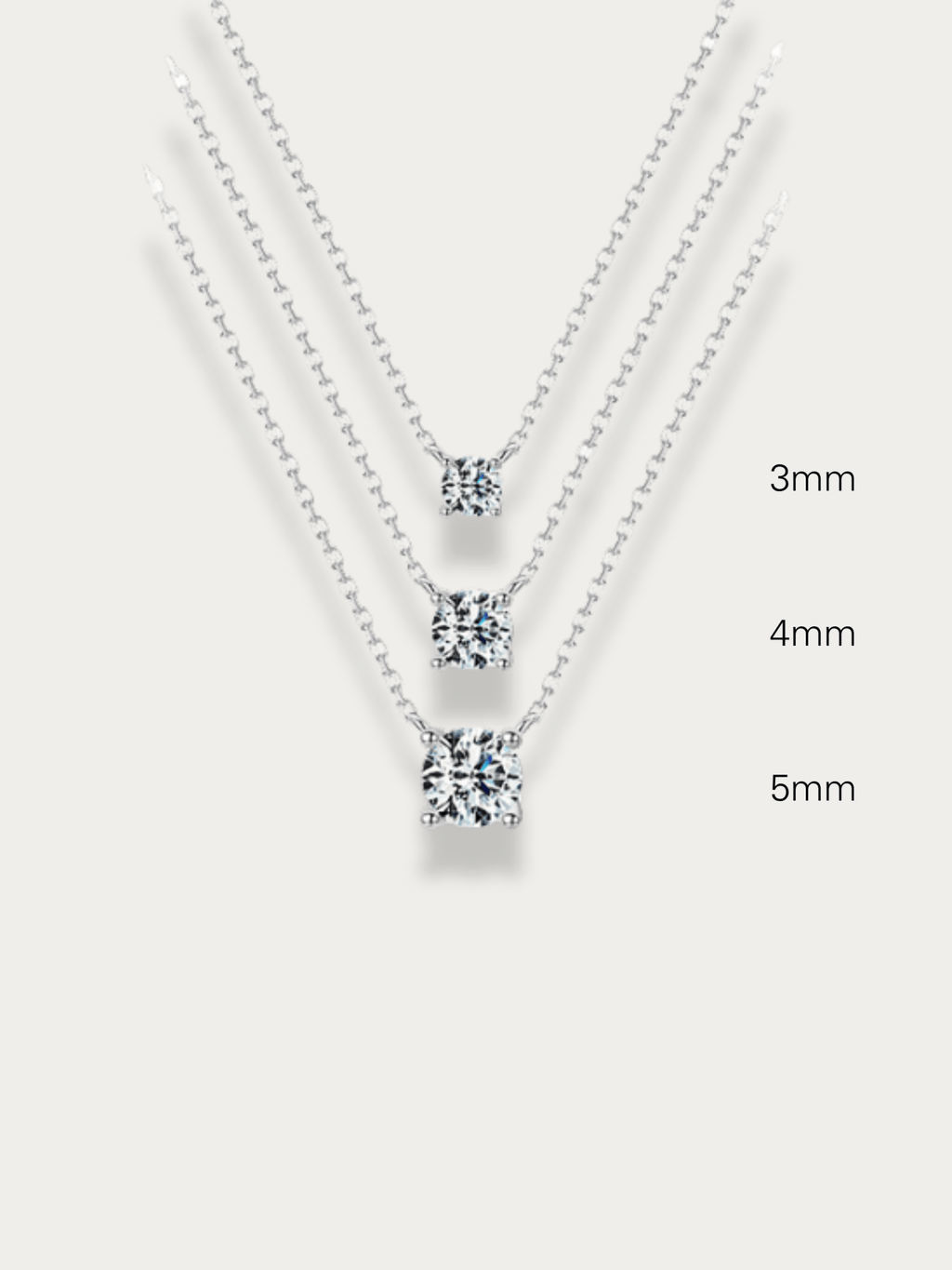 MNML Ray Solitaire Diamond Necklace in 3mm 4mm and 5mm flat lay — three size CZ solitaire