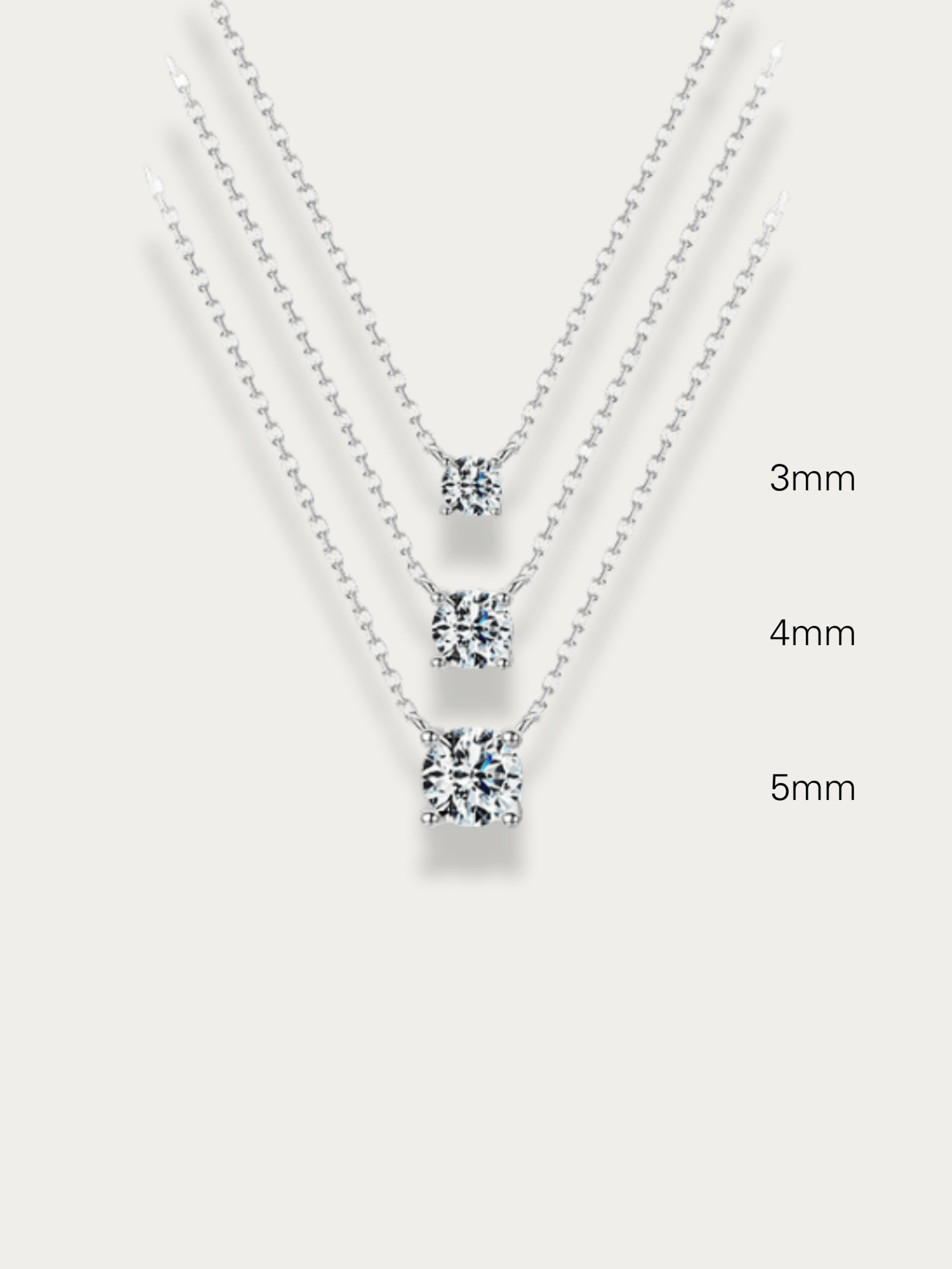 MNML Ray Solitaire Diamond Necklace in 3mm 4mm and 5mm flat lay — three size CZ solitaire