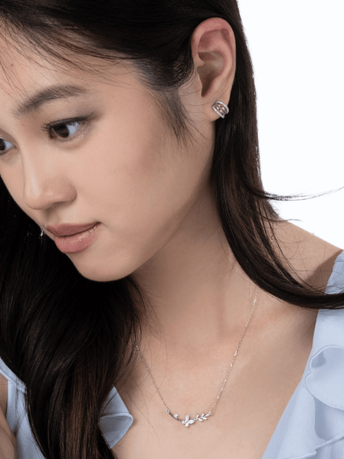 Reese crescent pavé stud worn on the ear lobe